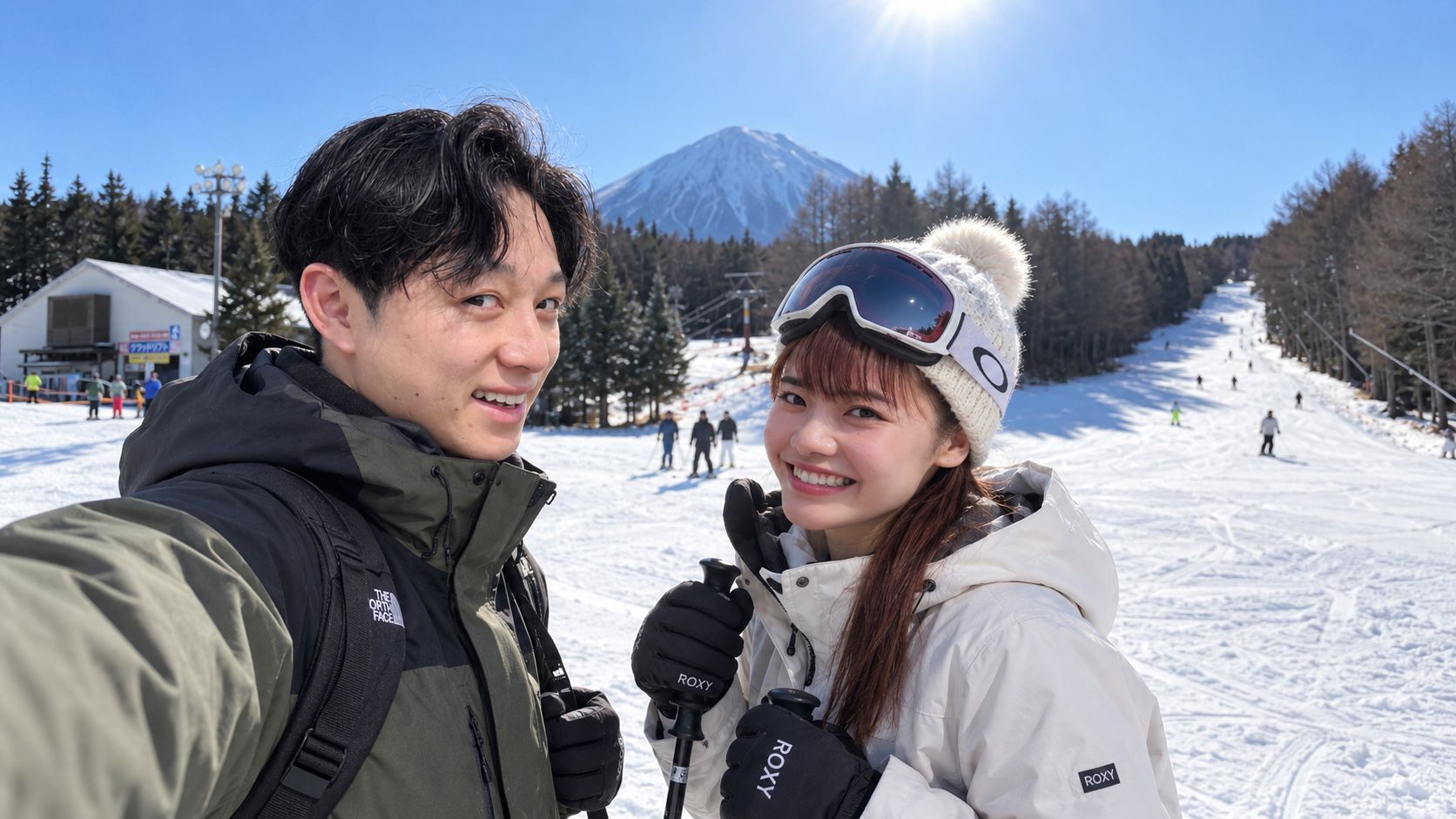 ゲレンデで一緒に滑るカップル